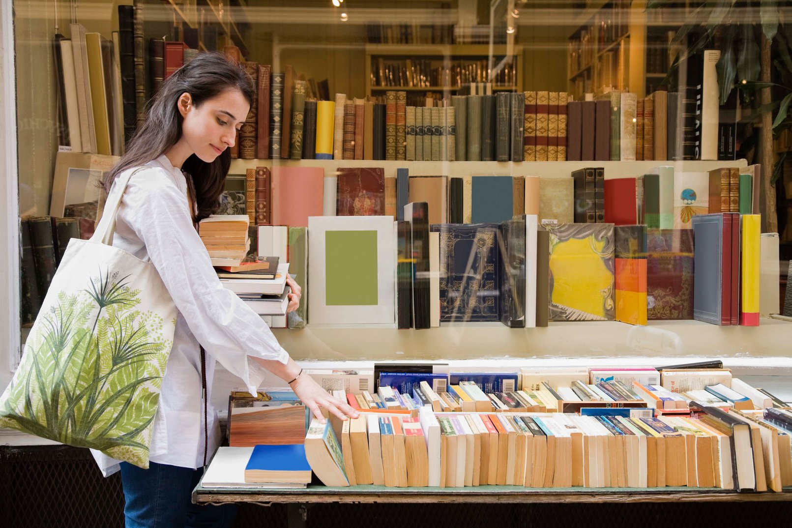 Woman shopping at secondhand bookstore